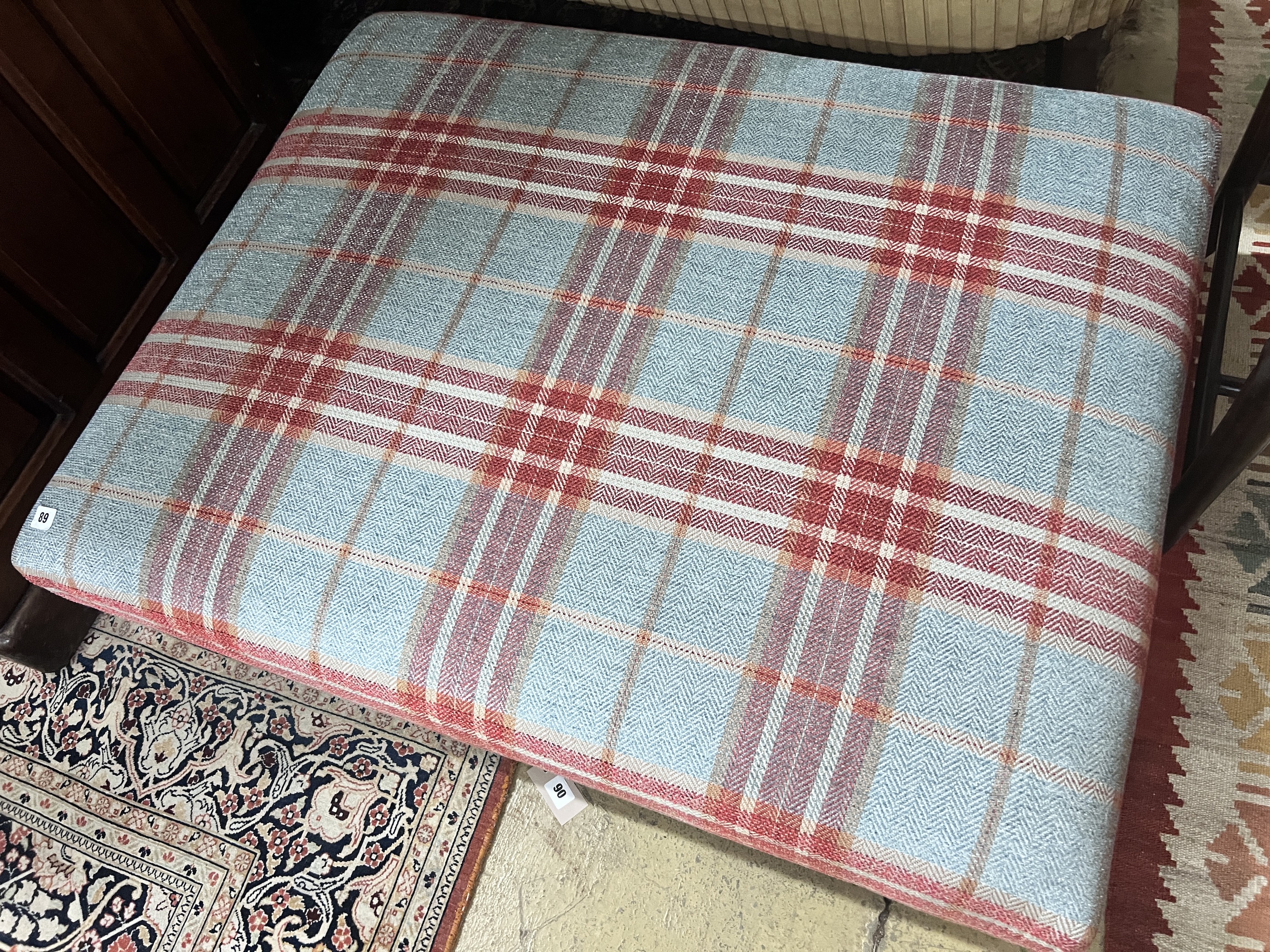 A large rectangular contemporary footstool upholstered in Colefax & Fowler tartan fabric, length 102cm, width 82cm, height 27cm
